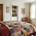 Retro-Mod Orchid King quilt shown on a bed in a modern farmhouse styled bedroom.