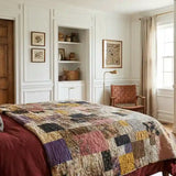 Retro-Mod Orchid King quilt shown on a bed in a modern farmhouse styled bedroom.