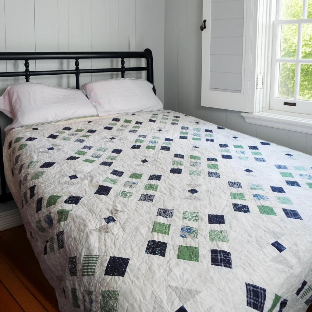 shoreline queen quilt on bed