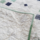 shoreline queen quilt with backing flipped over