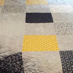 close up of handmade queen somerset blues quilt