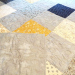 queen quilt with backing flipped over