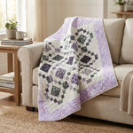 Evening Lattice draped over the corner of a neutral sofa, bringing a pop of color to the room