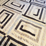 Close up of finished black and white handmade twin quilt