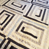 Close up of finished black and white handmade twin quilt