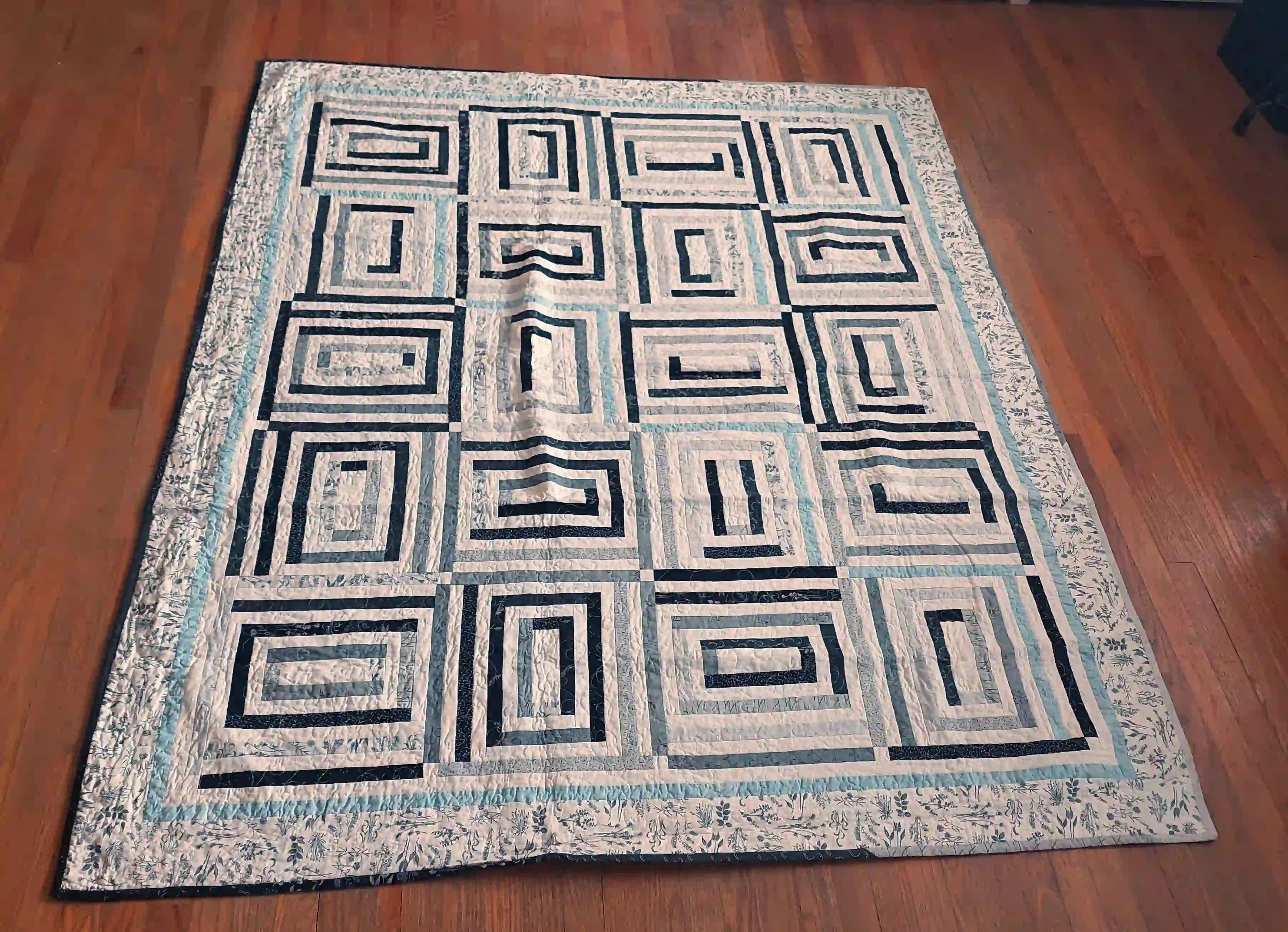 Handmade quilt flat lay displaying entire quilt