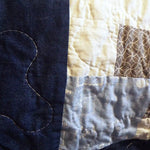 Detail shot showing the quilting stitches on handmade twin quilt