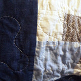 Detail shot showing the quilting stitches on handmade twin quilt