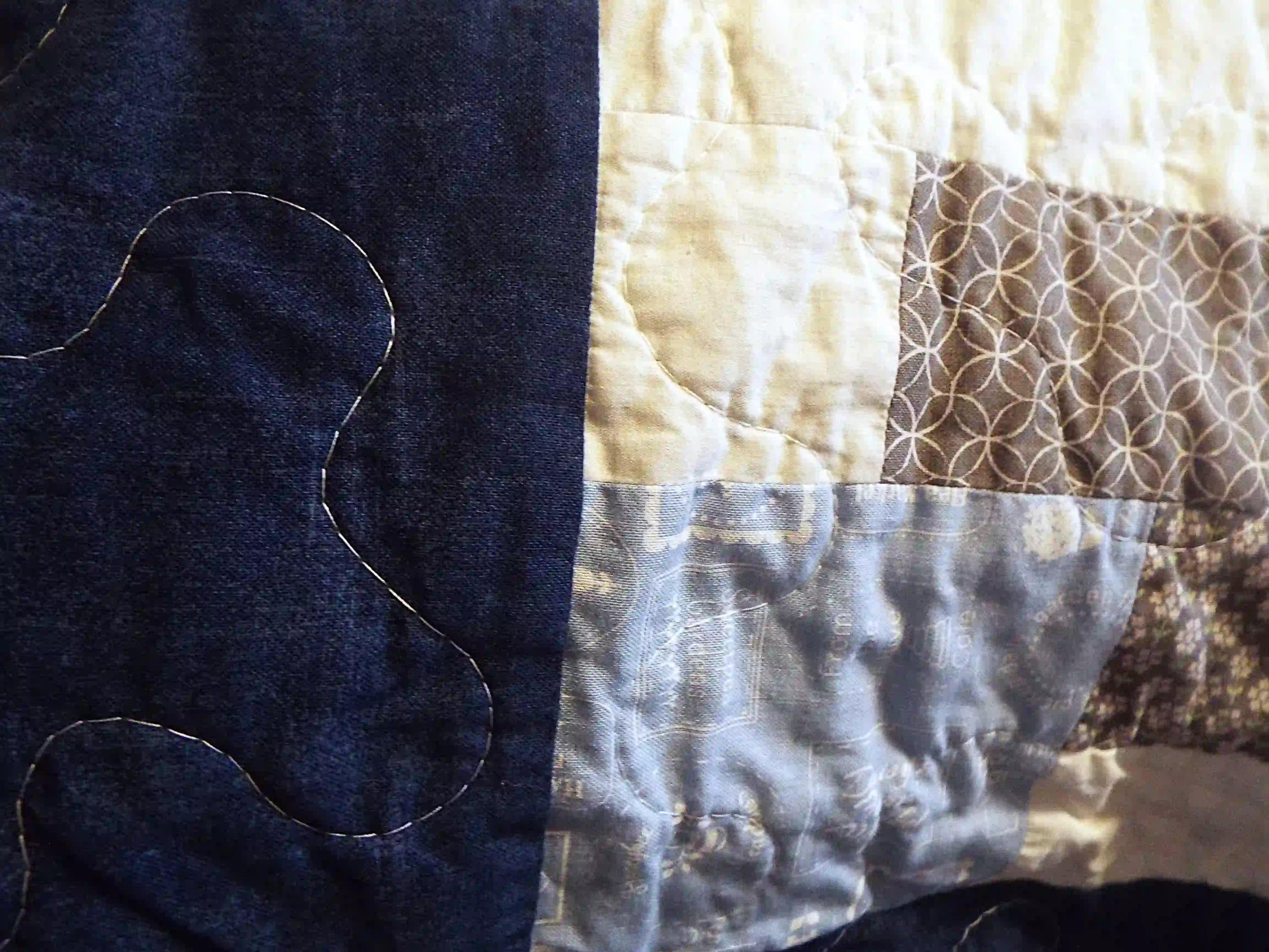 Detail shot showing the quilting stitches on handmade twin quilt