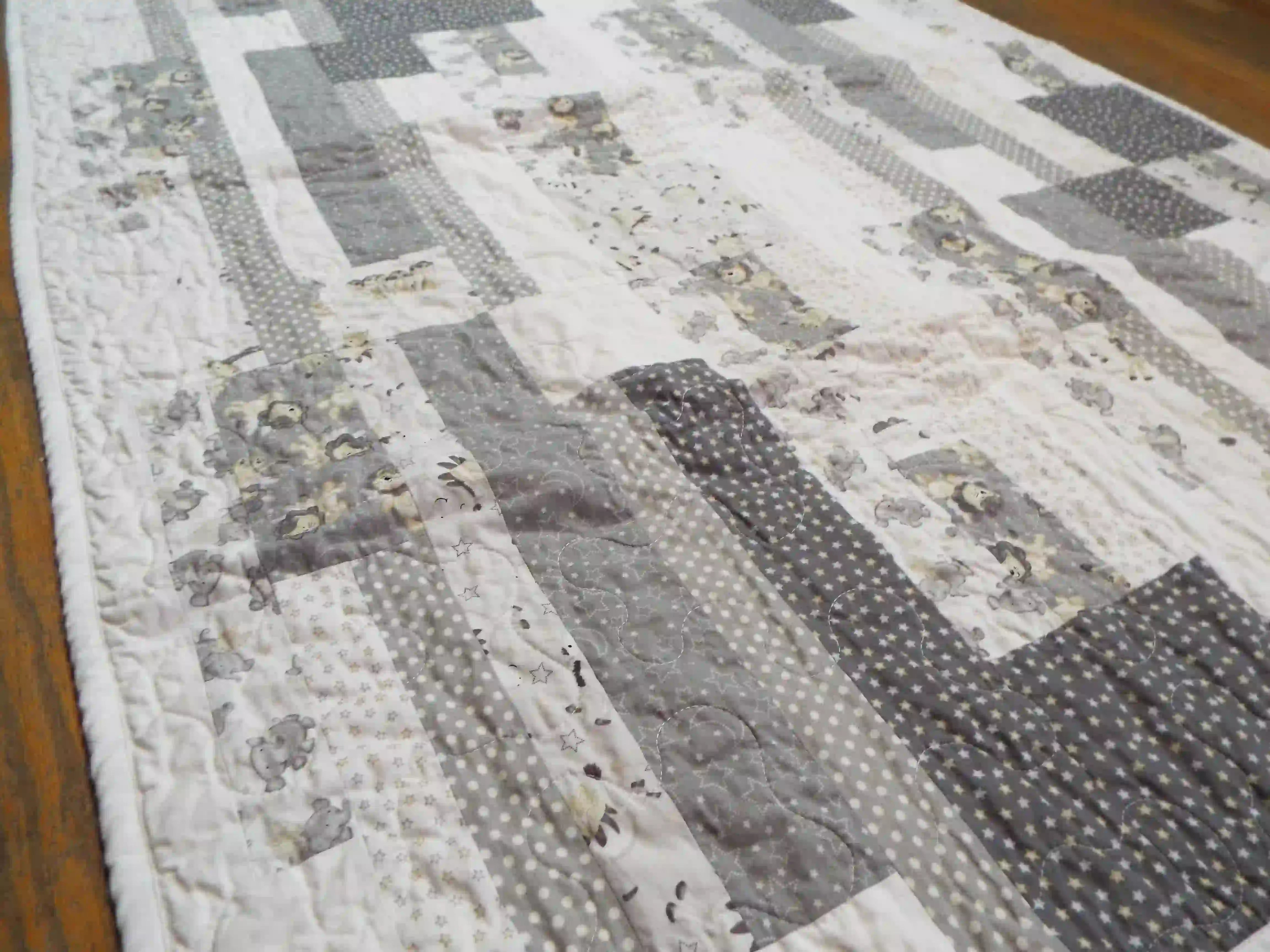 Angled lay of Starlit Trails showing quilt top detail