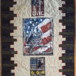 Flat lay of the Army Eagle tribute quilt showing the entire quilt top