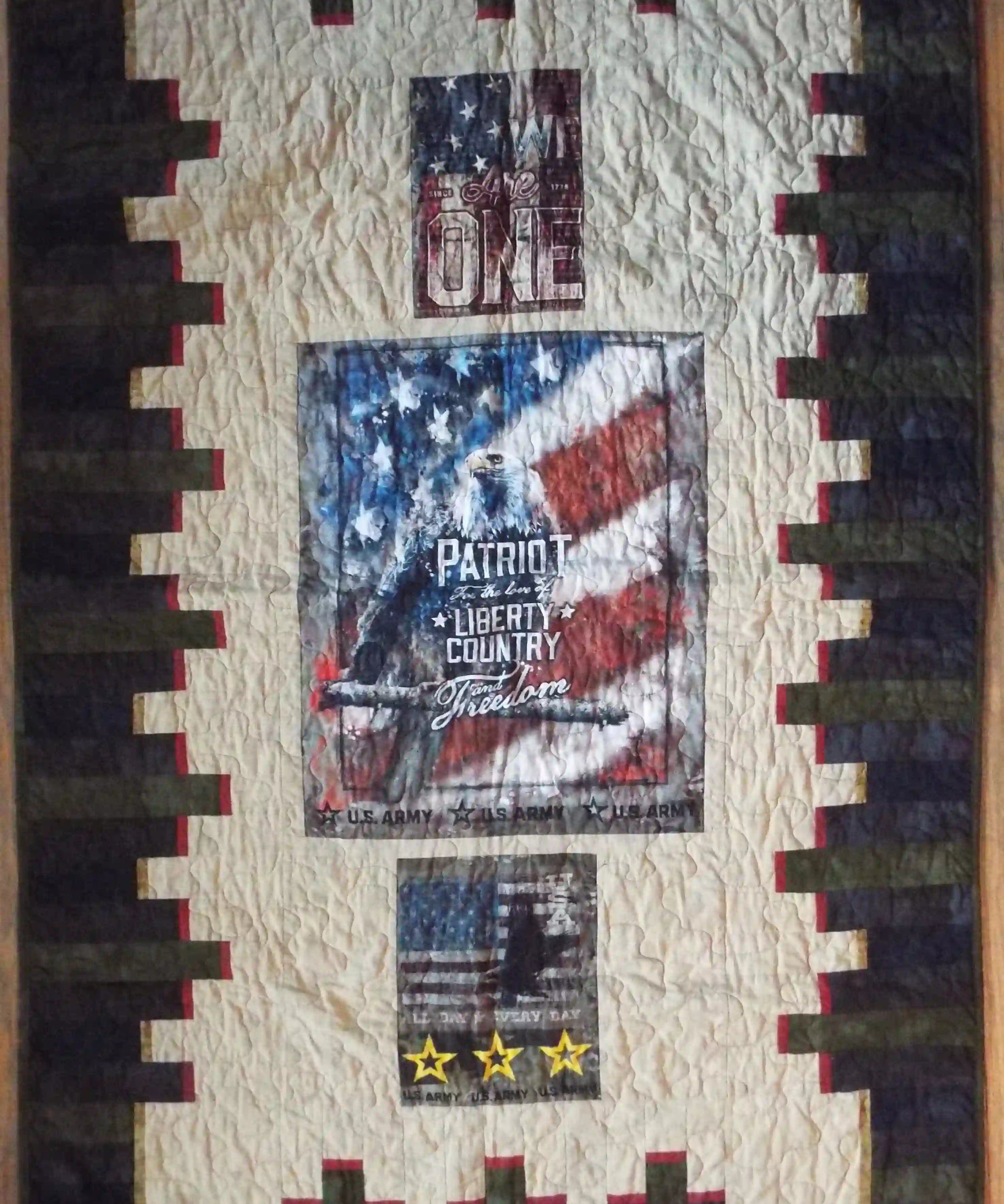 Flat lay of the Army Eagle tribute quilt showing the entire quilt top