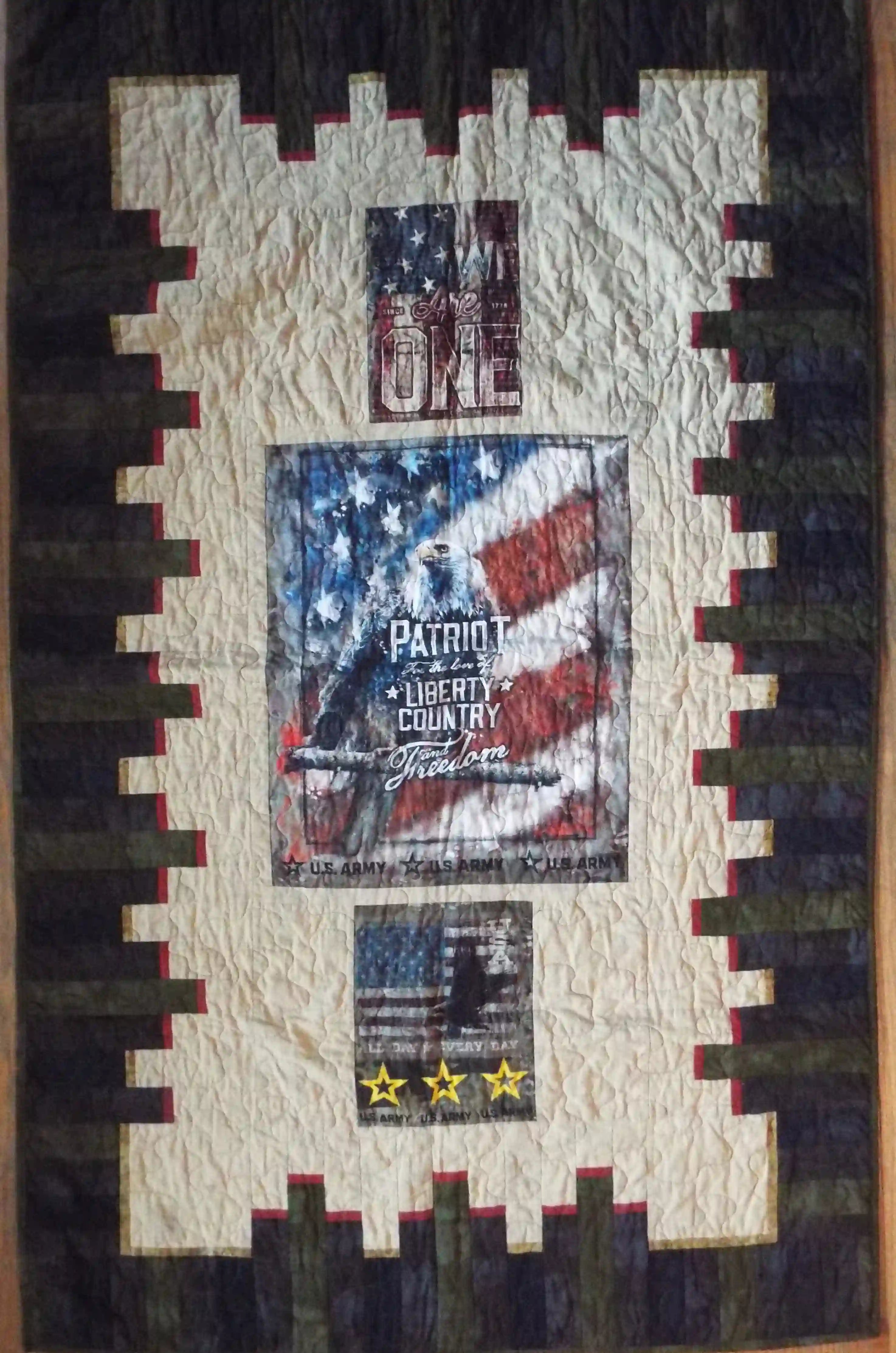 Flat lay of the Army Eagle tribute quilt showing the entire quilt top