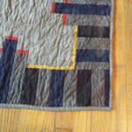 Close up shot of corner to show stitching and piecing detail