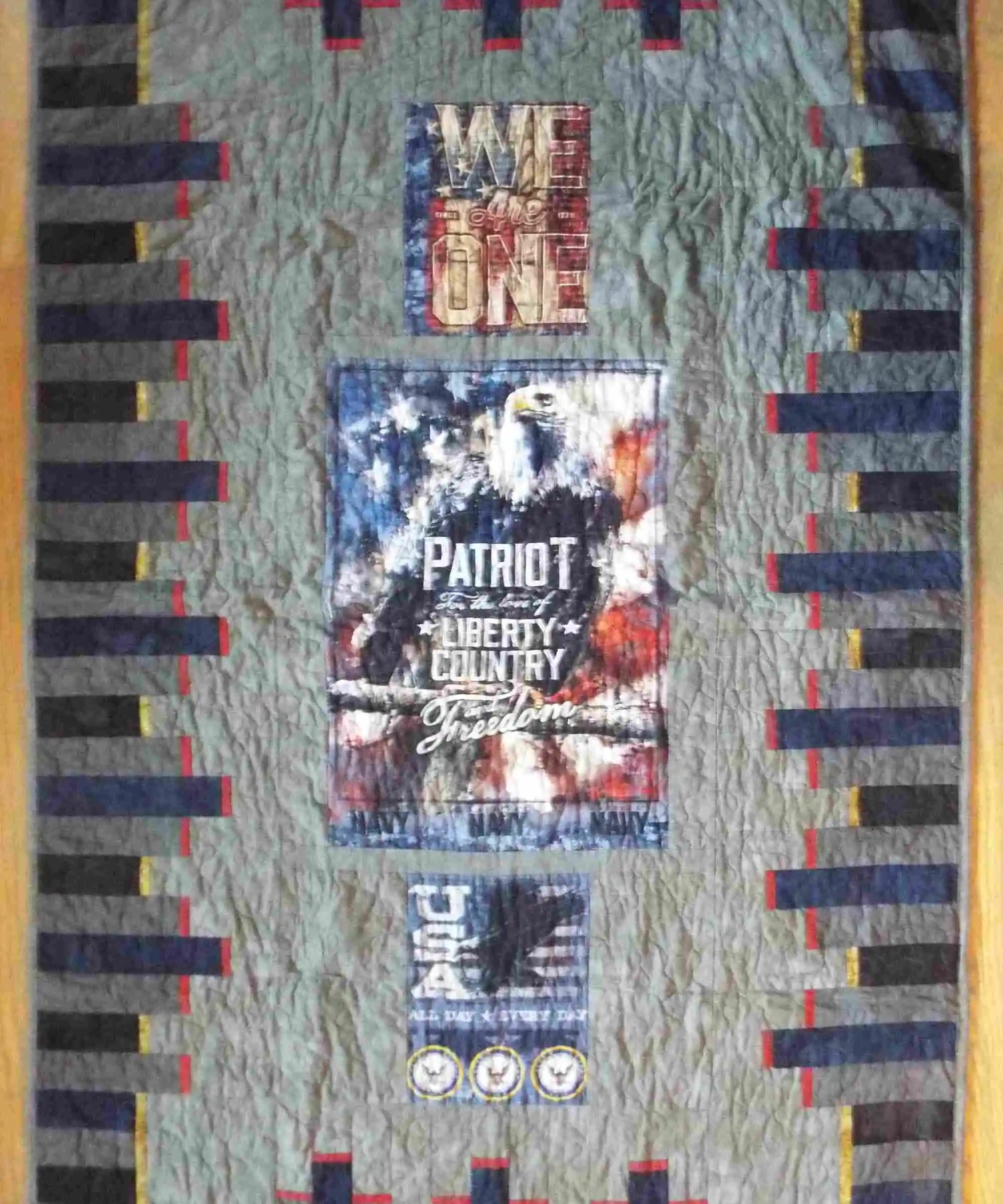 Flat lay of eagle tribute quilt showing entire quilt top