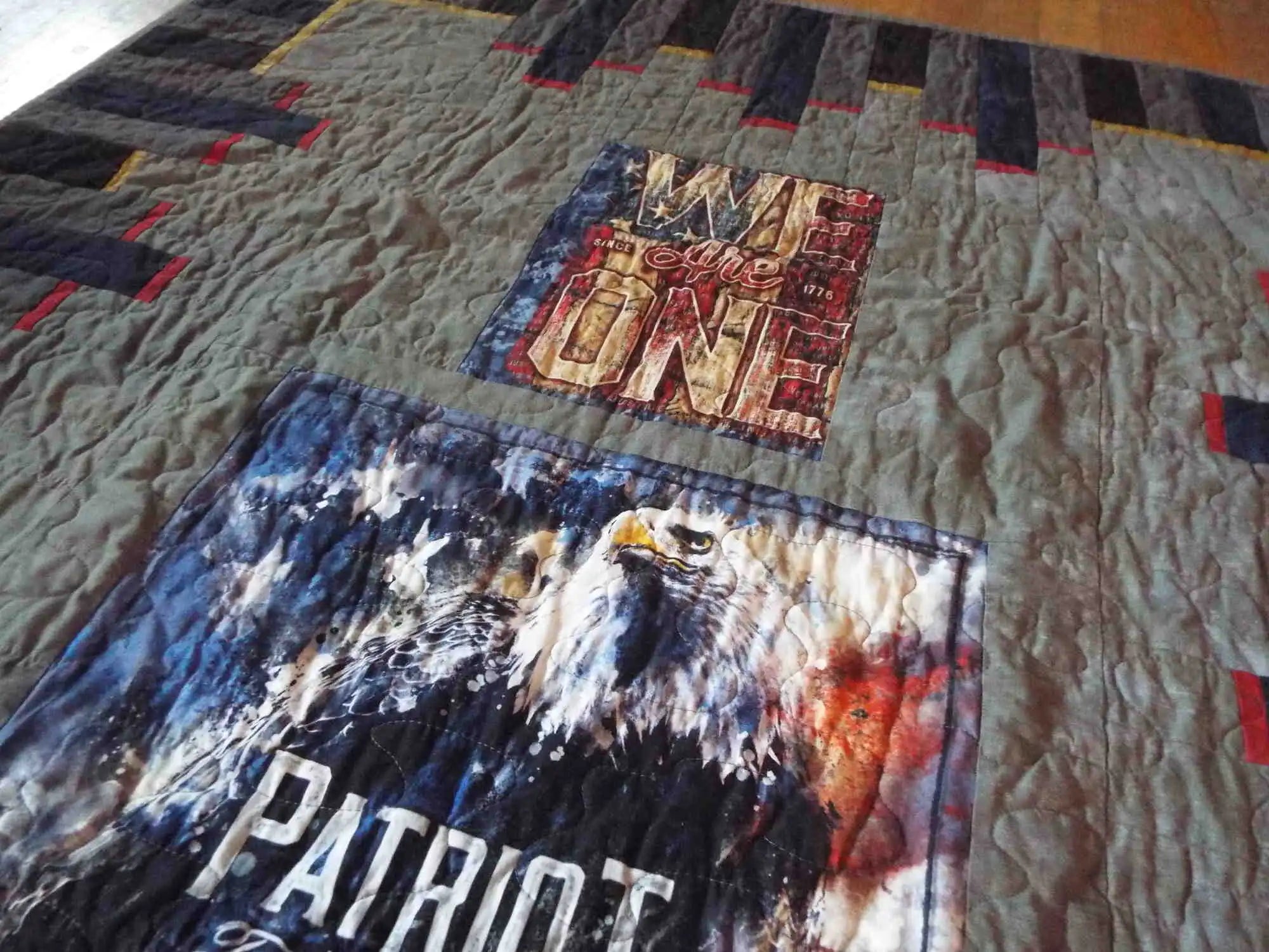 Close up of We Are One panel on eagle tribute quilt