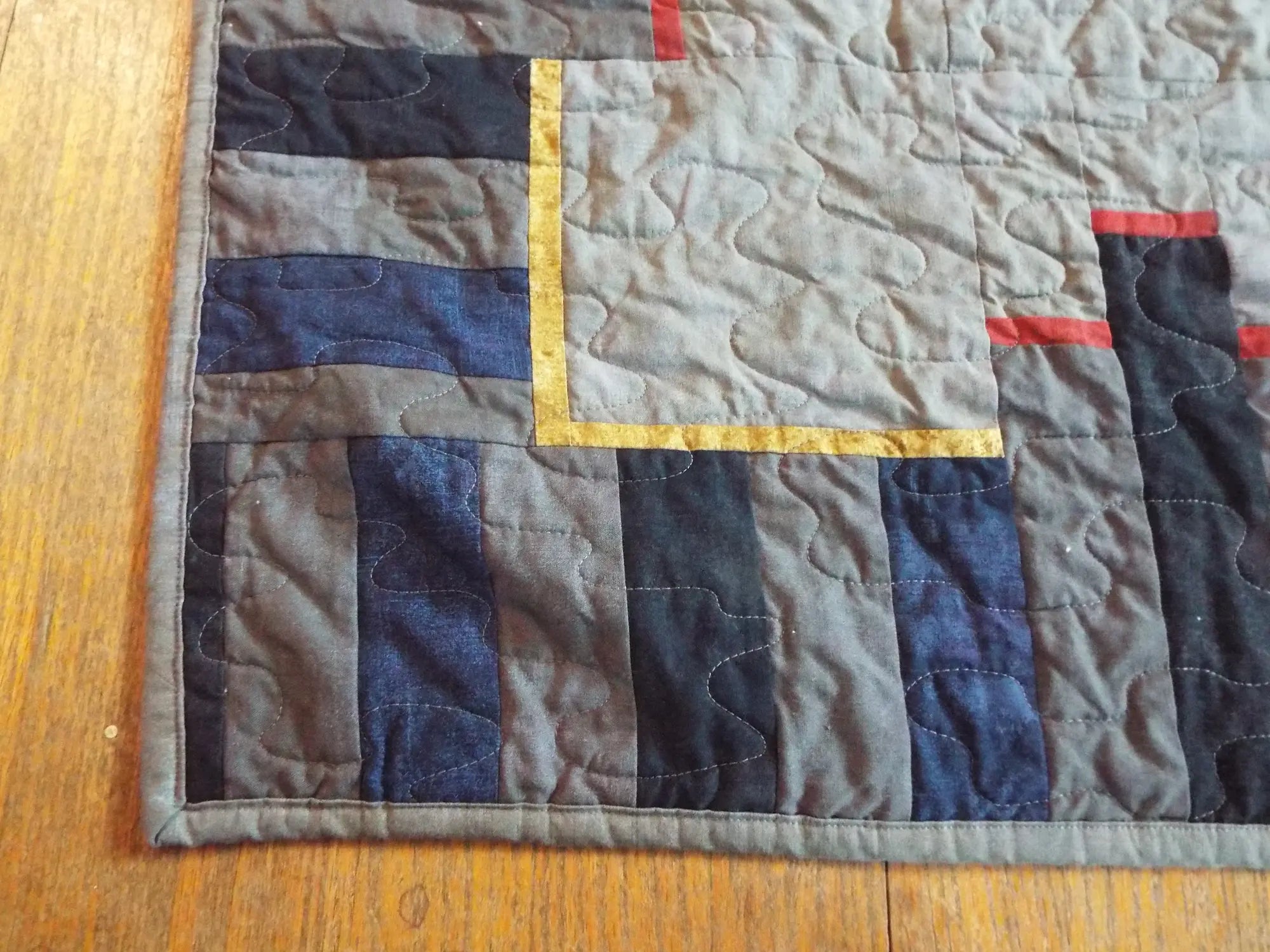 Close up of corner of tribute quilt