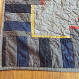 Close up of corner of tribute quilt