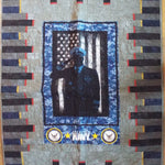 Flat lay of tribute quilt displaying entire quilt