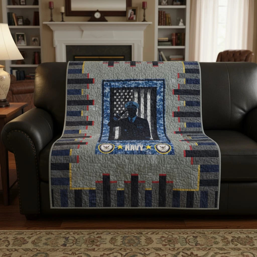 Tribute quilt shown draped over a black leather sofa in a traditional living room.