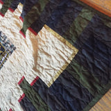 Corner detail shot of soldier quilt