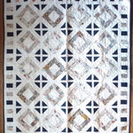 Handmade quilt flat lay showing entire quilt