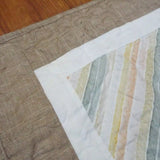 Closer look at quilt stitching and binding of handmade quilt