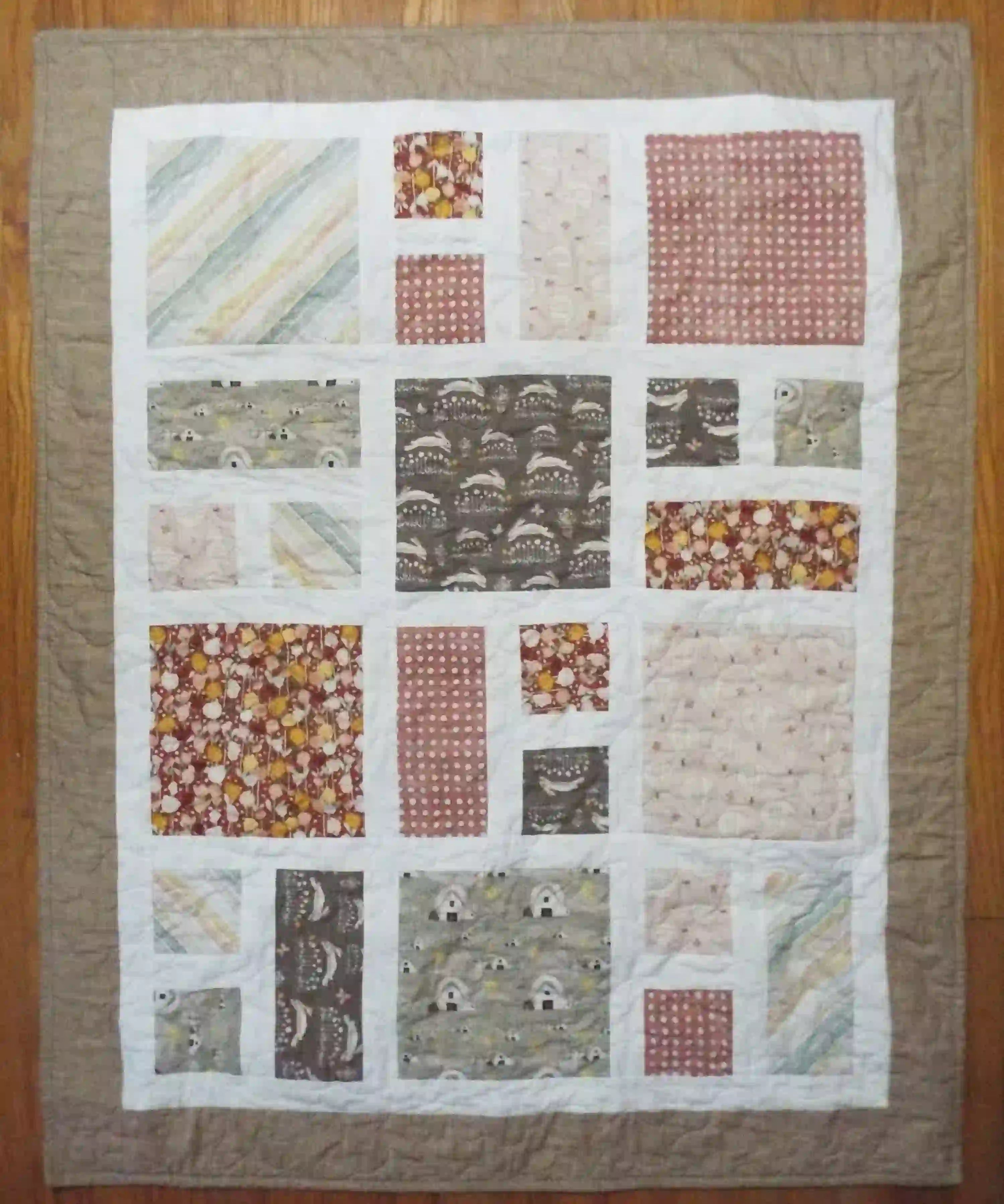 Flat lay of handmade quilt showing entire quilt.