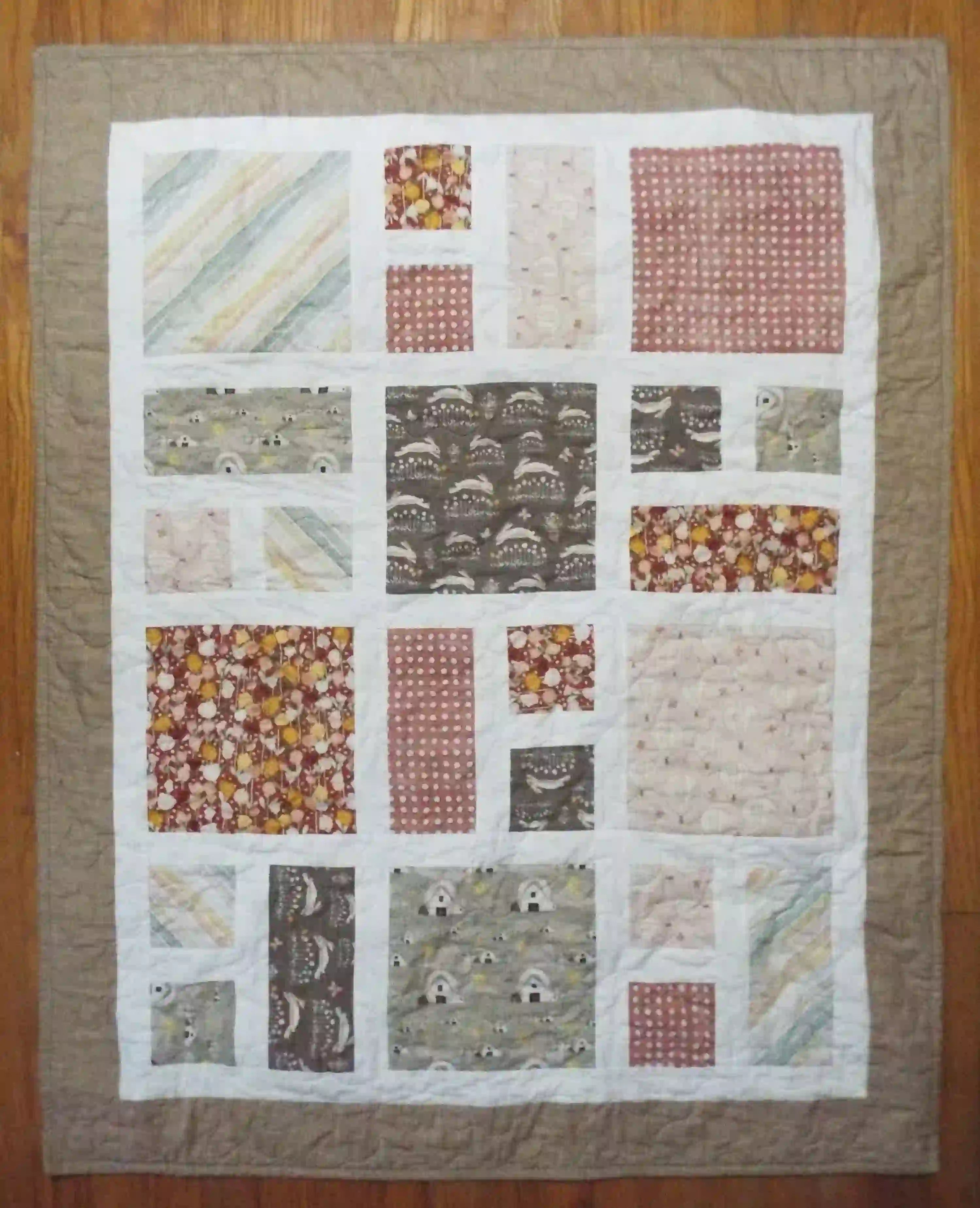 Flat lay of handmade quilt showing entire quilt.