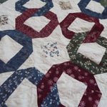 Stitching and piecing detail of Winter Links Lap Quilt.