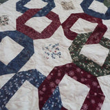 Stitching and piecing detail of Winter Links Lap Quilt.