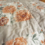 Detail of quilt stitching on Woven Stillness queen quilt.