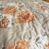 Detail of quilt stitching on Woven Stillness queen quilt.