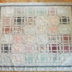 Woven Stillness queen quilt flat lay showing entire quilt and fabrics used